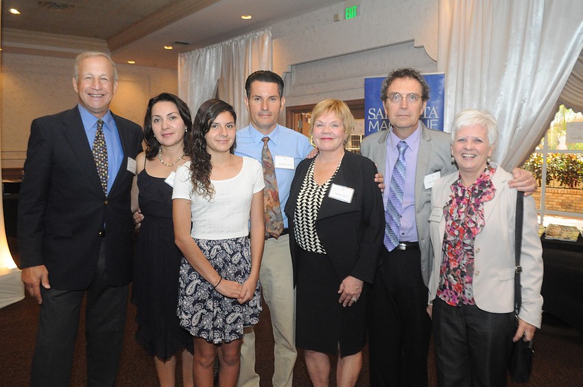 Chuck and Robyn Citrin with the Villa family, Jenny, Juliana and Mauricio, center, and Yvonne and Jean Dumas, far right.
