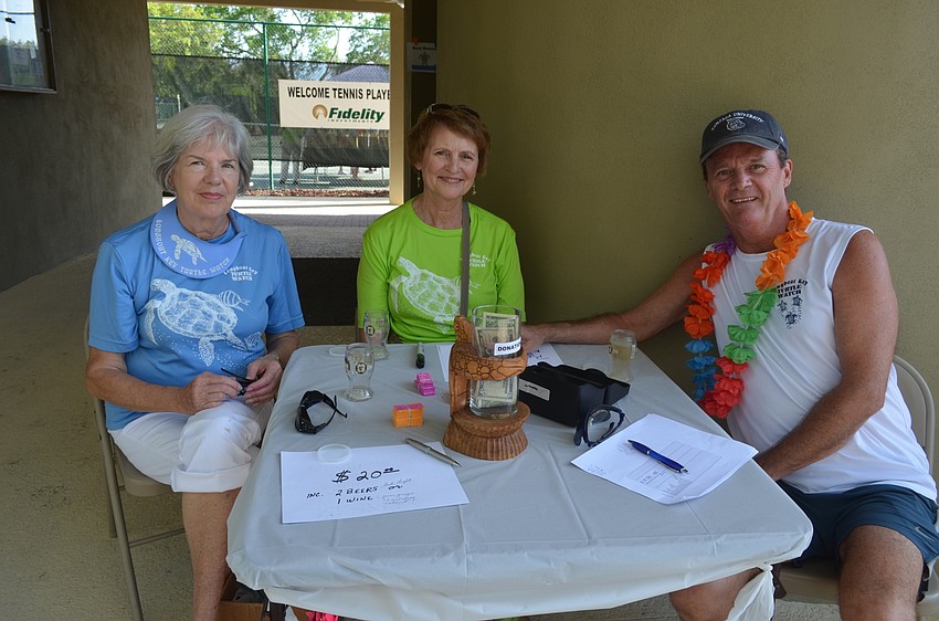 Volunteers Judy Williams, Rosemary Treonis and Bill Town
