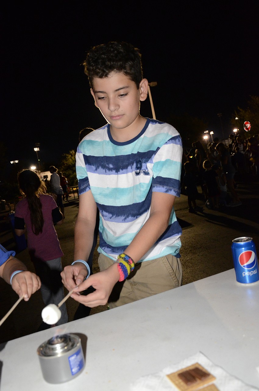 Juan Jose Alvarez makes a s'more.
