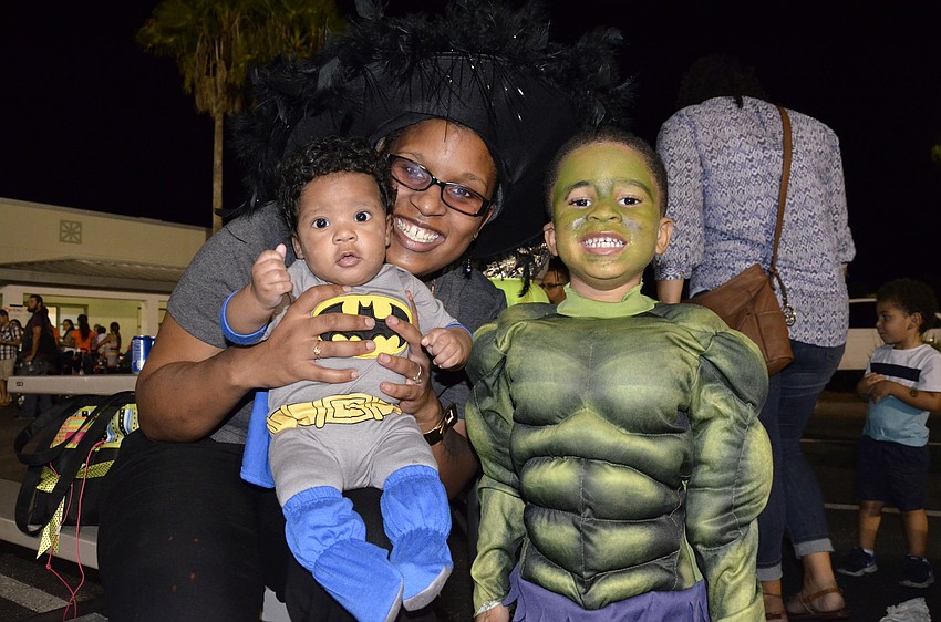 Bradenton resident Lula Jones dressed up for the festival with her two sons, Darryen, right, and Desi'Yon, left.
