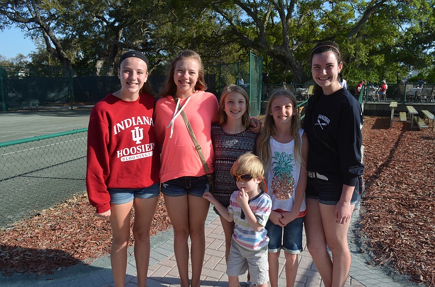 Margaret, 13, Grace, 15, Adele, 11, Thomas, 4, and Colleen, Carlisle, 9, with Magan Leonard, 15