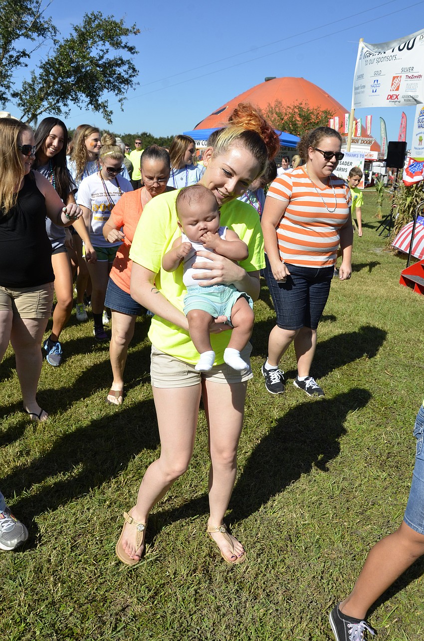 Jasmine and Kane Rodriguez dance to the Cupid Shuffle.