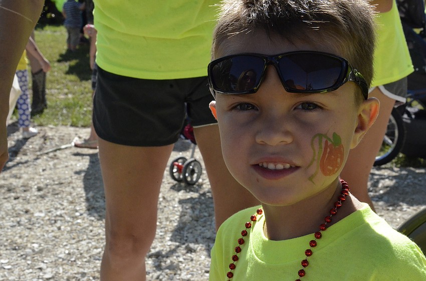 Pryor Gringras got a pumpkin painted on his face.