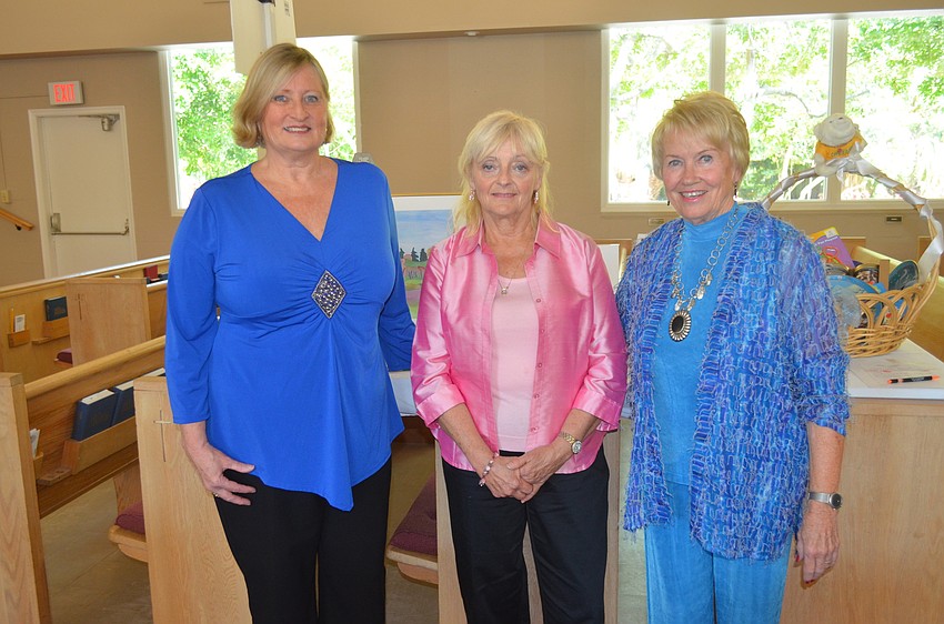 Event chairwomen Jan Herman and Miriam Russell with fashion show commentator Sue Reese