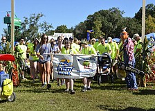 The king and queen lead the 1 mile walk.
