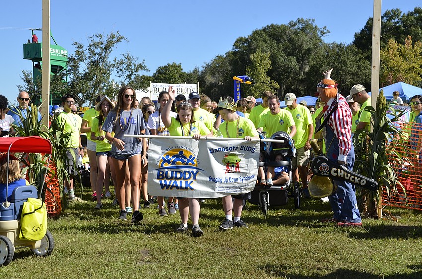 The king and queen lead the 1 mile walk.