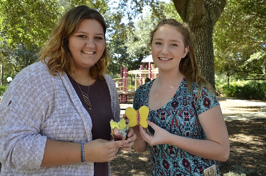 Tallea Kasper and Calista Carroll volunteered with the Gilbert W. McNeal PTO.