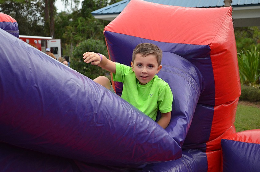 Liam Kelche takes on the obstacle course.