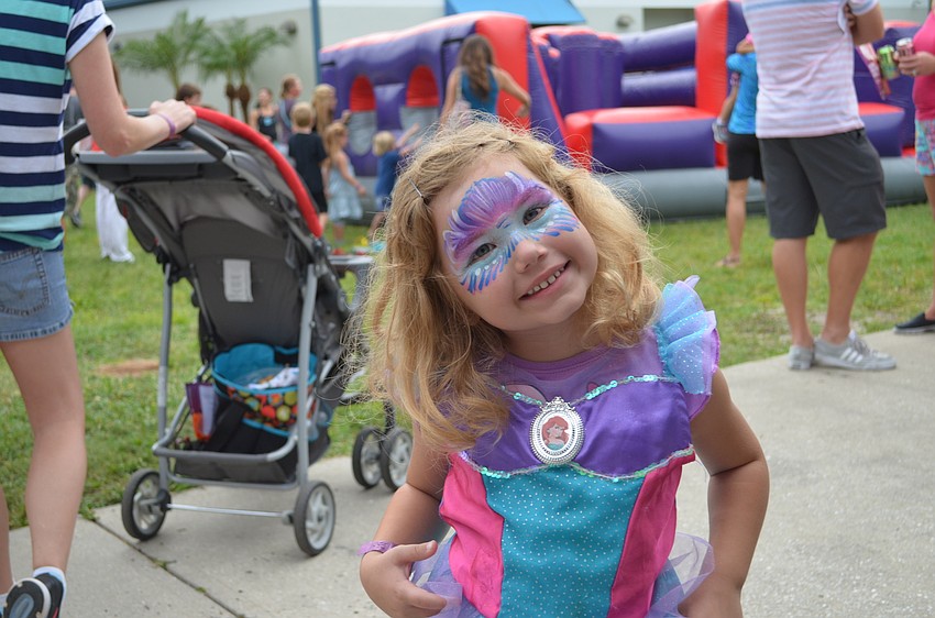 Madison Fleahman shows off her face paint.