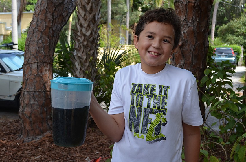 Noah Brasgalla used the gathering as an opportunity to try out his science fair project. He had guests sample three different colored juices to determine what flavor it was.