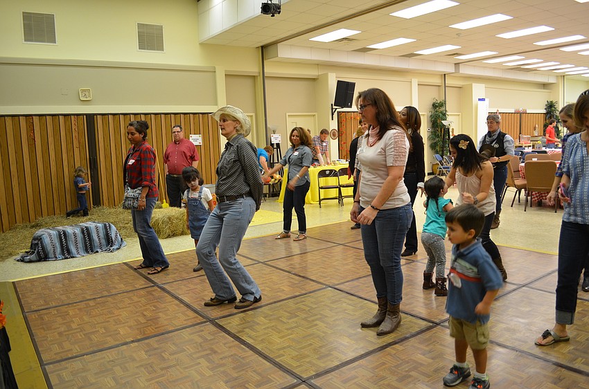 Guests learn how to dance to the 