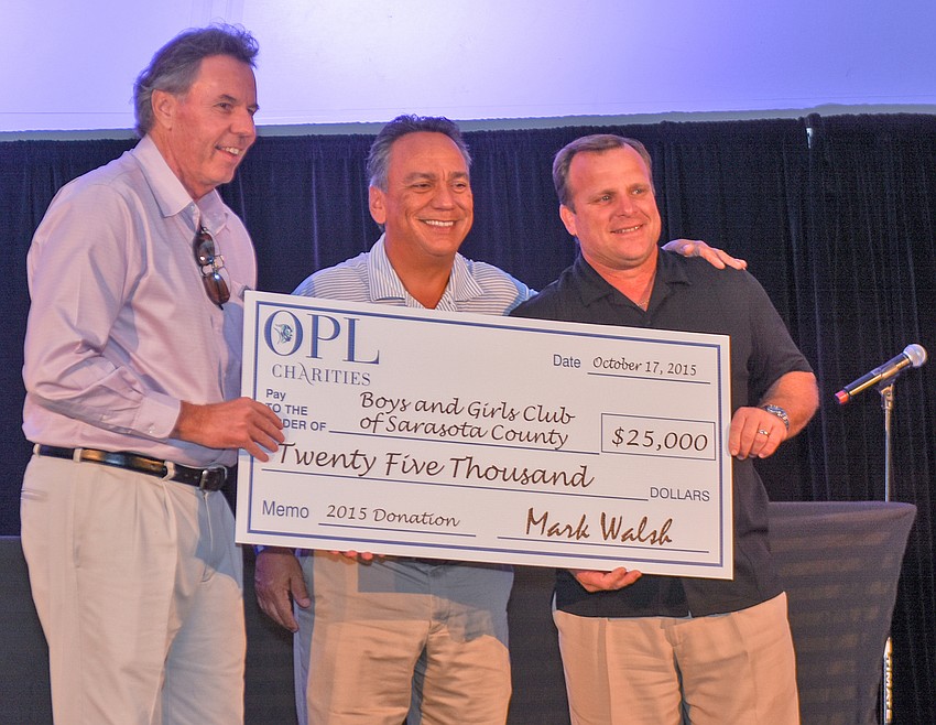 Ocean Properties Vice President Mark Walsh, Jaime DiDomenico, board chairman of the Boys & Girls Club, and Bill Sadlo, Boys & Girls Club president and CEO