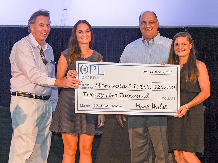 Ocean Properties Vice President Mark Walsh, Manasota B.U.D.S board member Shaina Vaughn, Manasota B.U.D.S President Mike Feduccia and Manasota B.U.D.S board member Caitlin West