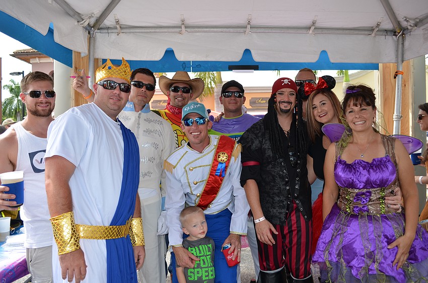 The cast of characters representing the North Port Fire Rescue went with a Disney theme in honor of a former colleague.