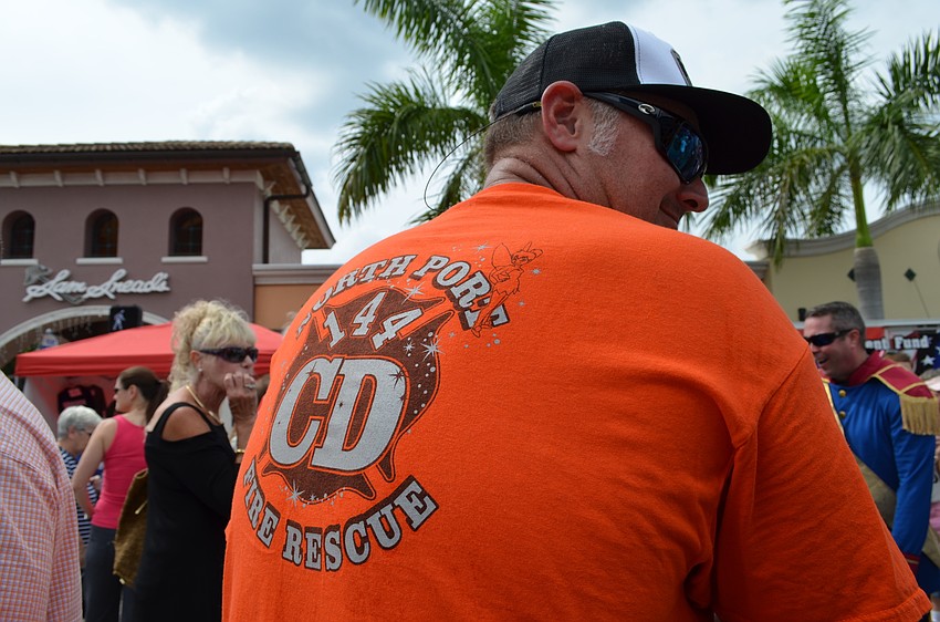 Lt. Ron Jekonski of the North Port Fire Rescue commemorates Christina Doyle who died of leukemia in May.