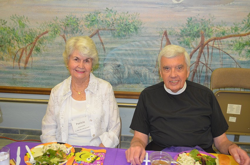 Pat Stusek and Msgr. John Dreasen