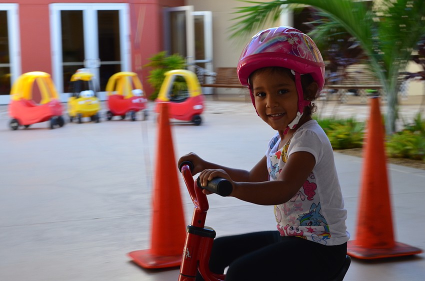 Isabella McDougall rounds the corner in the courtyard.