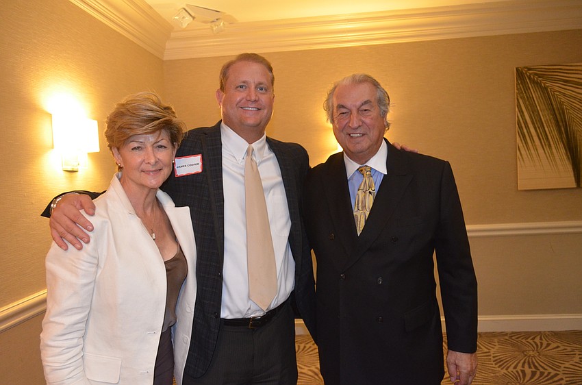 Nancy McElmeel, James Cooper and President Joe McElmeel