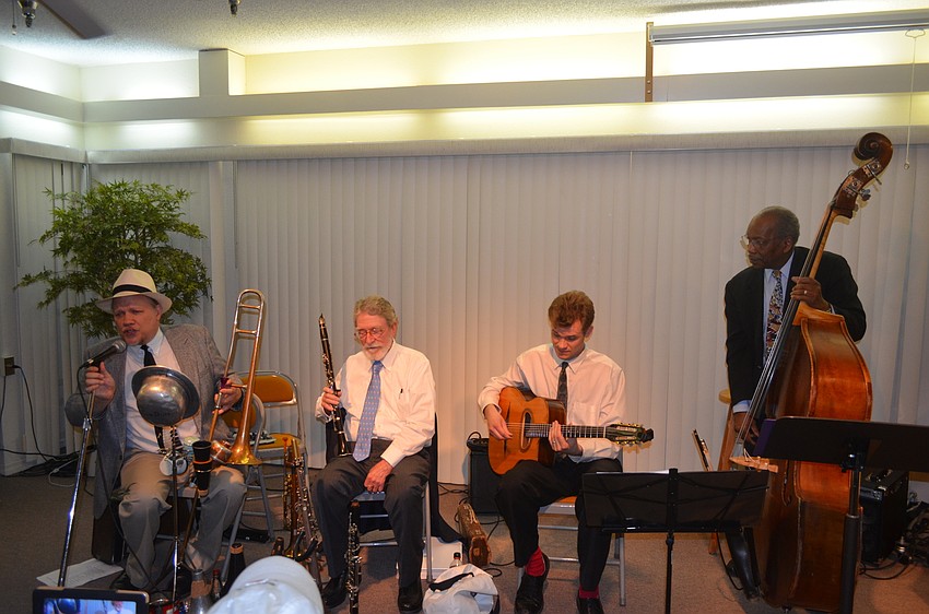 Kid Dutch, horns and vocal, Henry Blackburn, reeds, Sam Miltich, guitar, and John Lamb, string bass