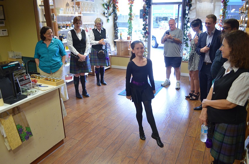 Molly McWilliams of the local group Drake Irish Dancers performs for the whiskey lovers in attendance at Vom Fass