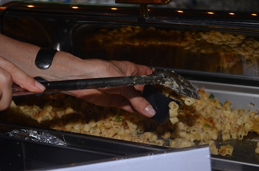 Blue Rooster's macaroni and cheese au gratin with sharp cheddar and smoked gouda.