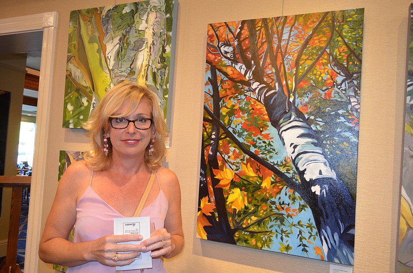 Artist Evelyn McCorristin Peters with “Zion Trees”