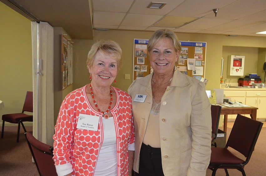 Sue Reese, Longboat Island Chapel communications chairwoman, and Chamber President Gail Loefgren