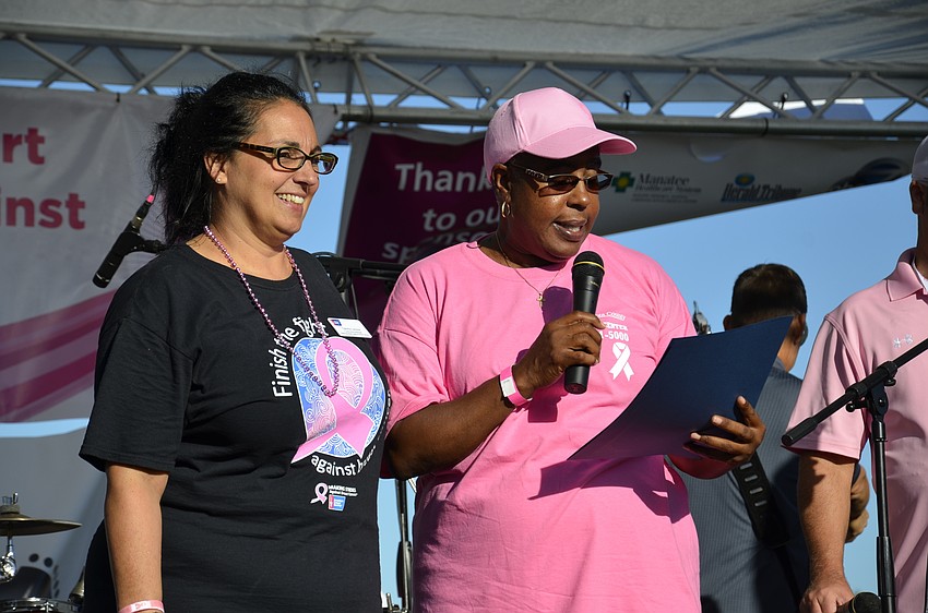 Sarasota County Commissioner Carolyn Mason reads a proclamation with Tammy Lennox, the American Cancer Society community events manager.