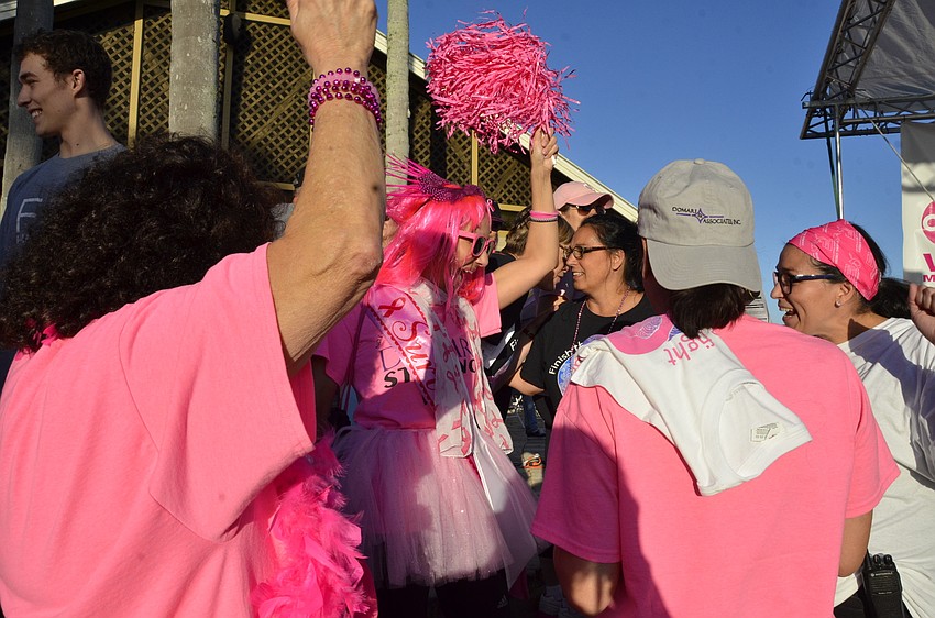 Michelle Olivo, an Osprey resident, celebrates after winning the Ritz-Carlton of Sarasota drawing for a two-night stay on Amelia Island.