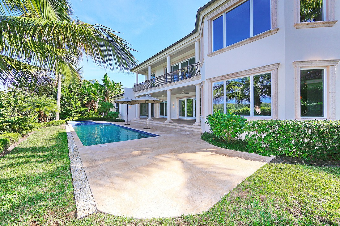 This home at 65 Lighthouse Point Drive has four bedrooms, four-and-a-half baths, a pool and 4,933 square feet of living area. It sold for $3,012,500. (Courtesy photo of Matthew Morris Premier Sothebyâ€™s International Realty)