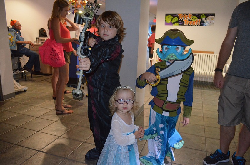 Ben Apostolou, 10, Penny Tharmer, 2, and Cameron Phelan, 6