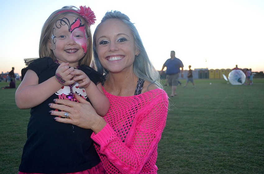 Jorja and Jaimi Lowe, of Esplanade, show off their pink pride for Breast Cancer Awareness Month.