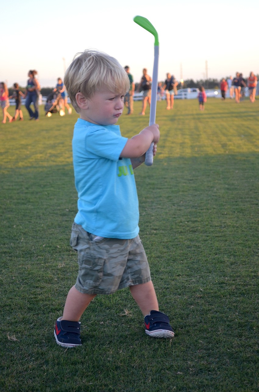 Jaxton Barnes focuses on his golf wing.