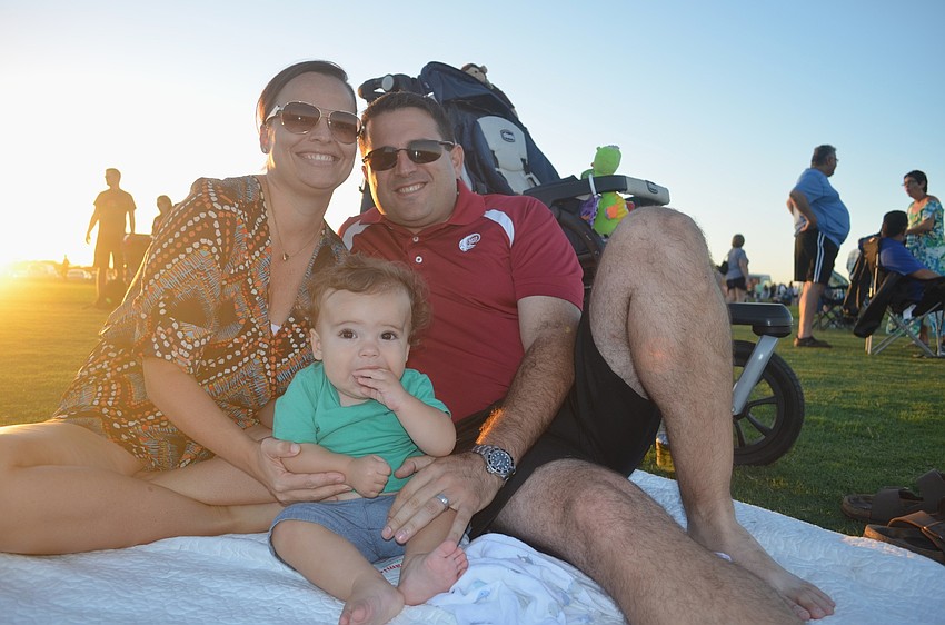 Greenbrook residents SUnshine, Gino and Rory enjoy a beezy night outside.