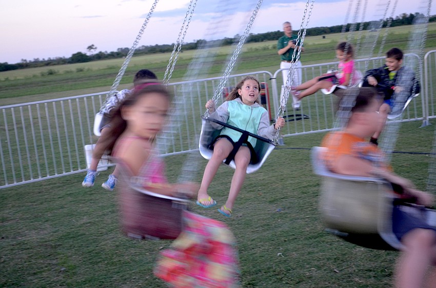 Jazmin Garcia, of Palmetto, braces for a fast ride.