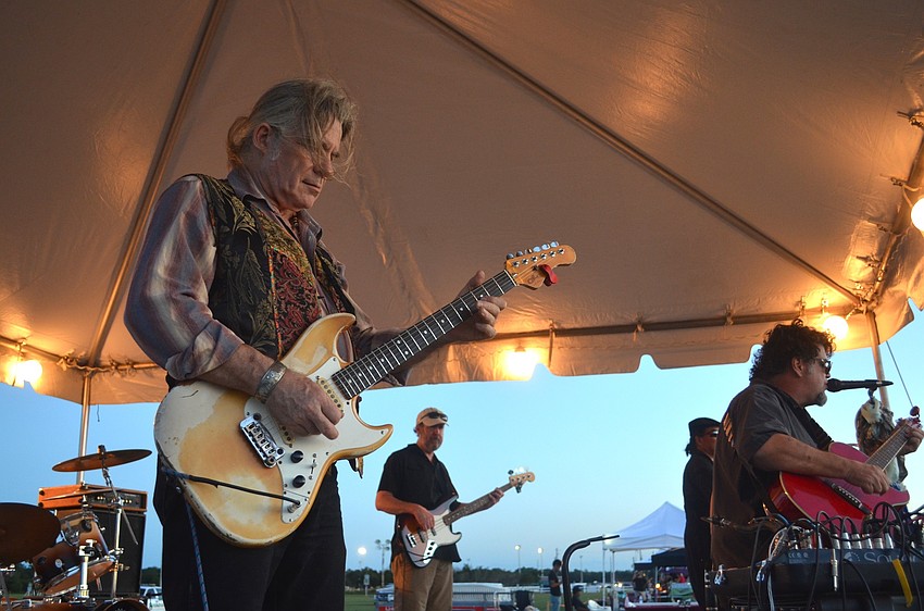Gary Drouin and fellow Koko Ray and the Keepers bandmates play for a cheering crowd.