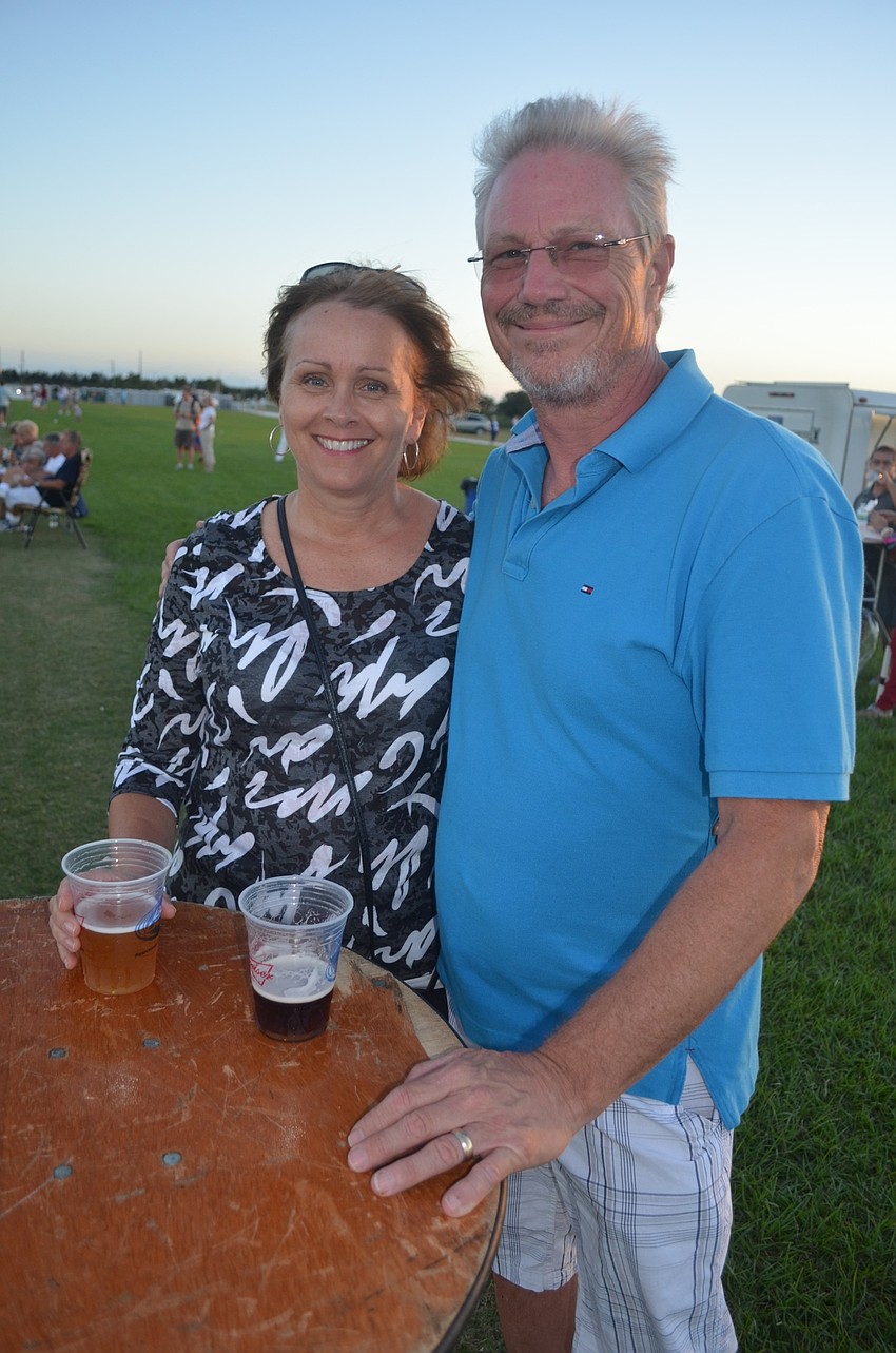 Carla and Steve Baer, of Esplinade, find a cute place to relax.