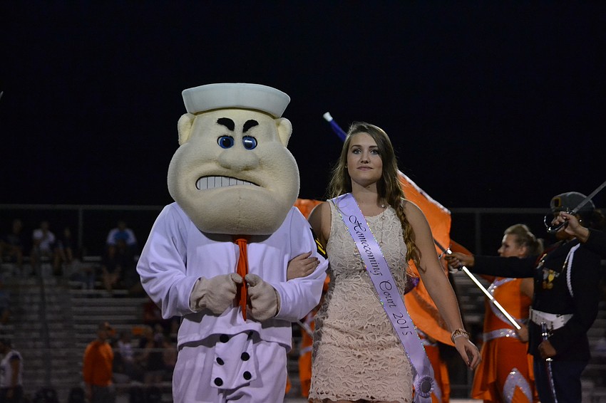 Sailor Sam escorts Alyssa Sloan.