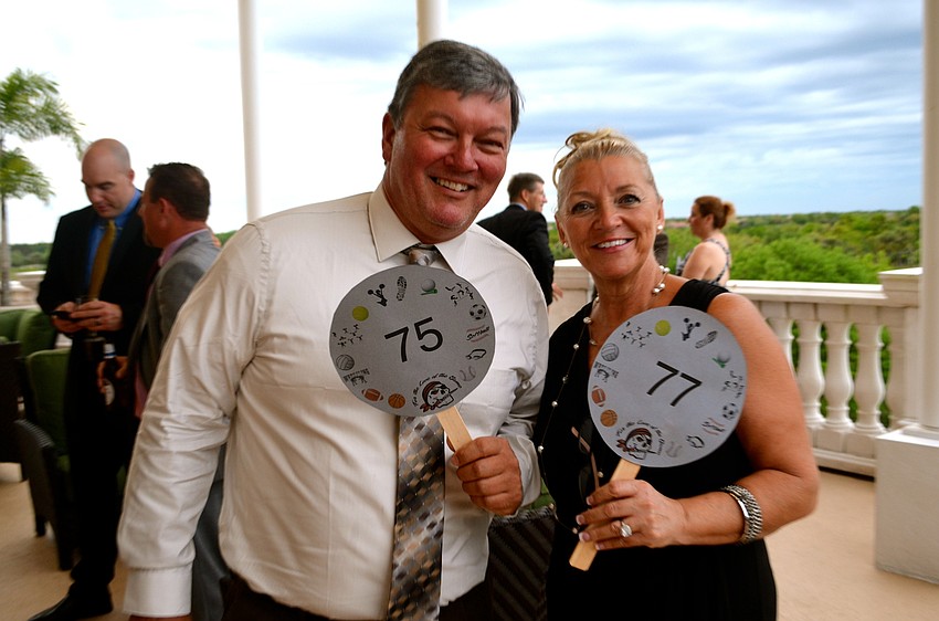 Don Engelberger and Lorraine McNab are ready for the silent auction.
