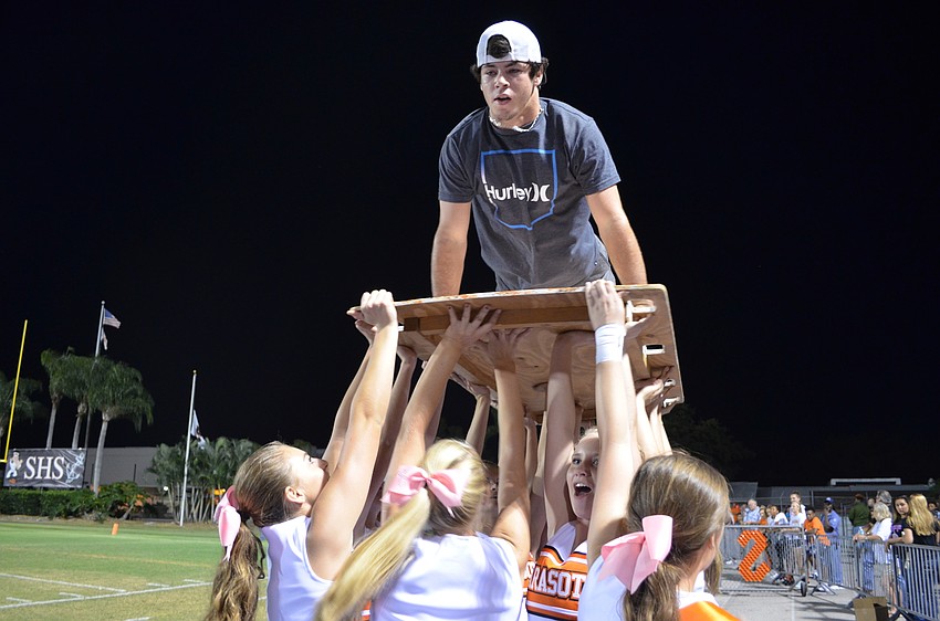 Joey Arnold does push ups following a touchdown.
