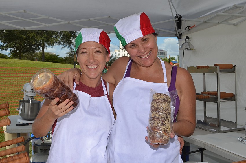 Hajnalka Konyher and Ana Robinson made traditional Hungarian kurtoskalacsakes or Chimney Cakes.