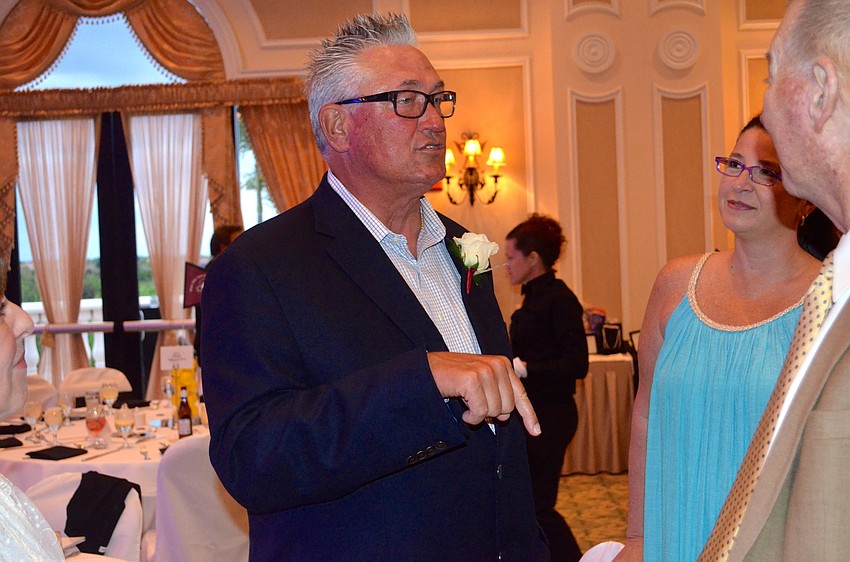 Guest speaker Cliff Hurdle tells friends what his mother always tells him, 