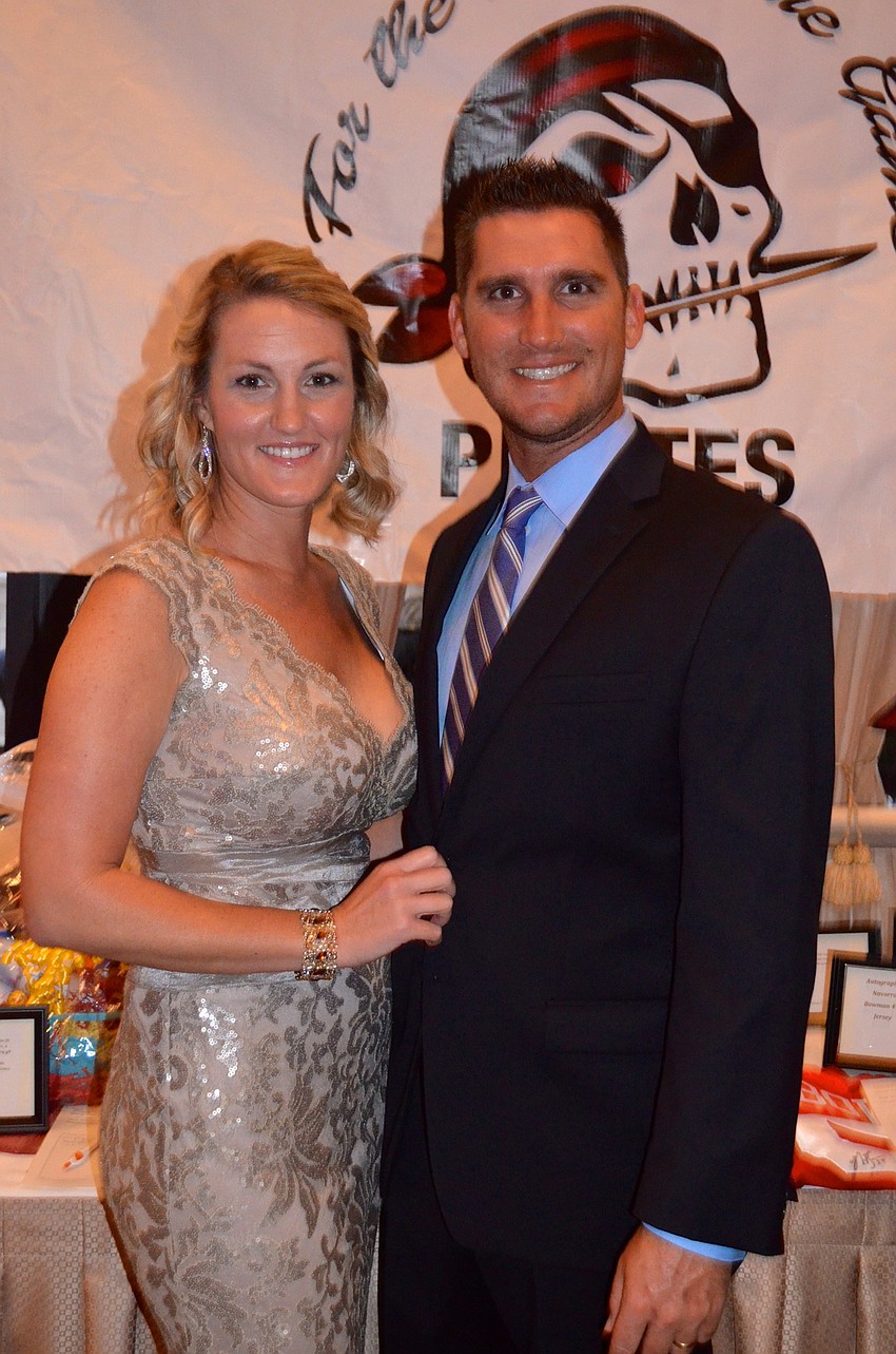 Brooke and Steve Ramsey browse the items available at the auction.