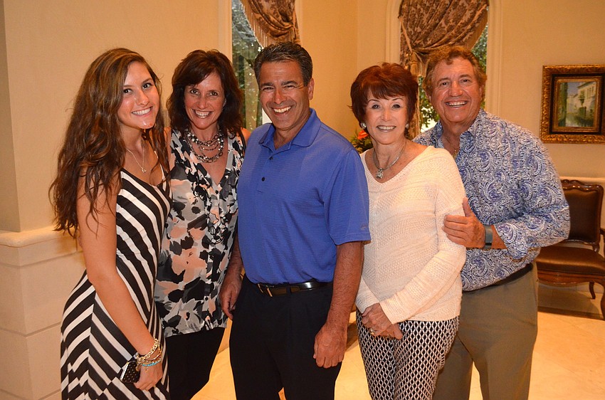Alexis, Michelle and Tom Sullivan chat with friends, Dorothy and John Turyan.