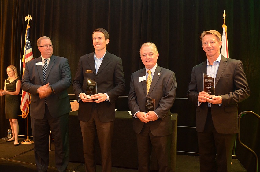 Representatives from Sarasota Ford, Plymouth Harbor on Sarasota Bay, and Sarasota Ford were awarded the chamber's 