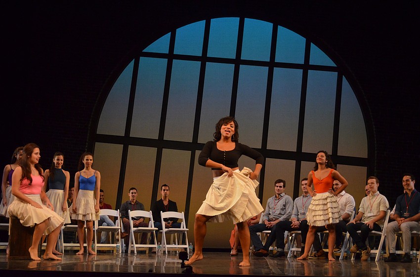Mary Antonini, center, leads her Puerto Rican powerhouse ladies of the Sharks gang through a rendition of 