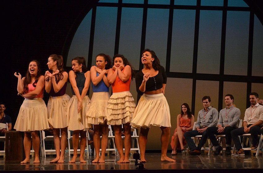 Marilyn Caserta (left) and Mary Antonini (right) argue between the Shark girls in the classic number 
