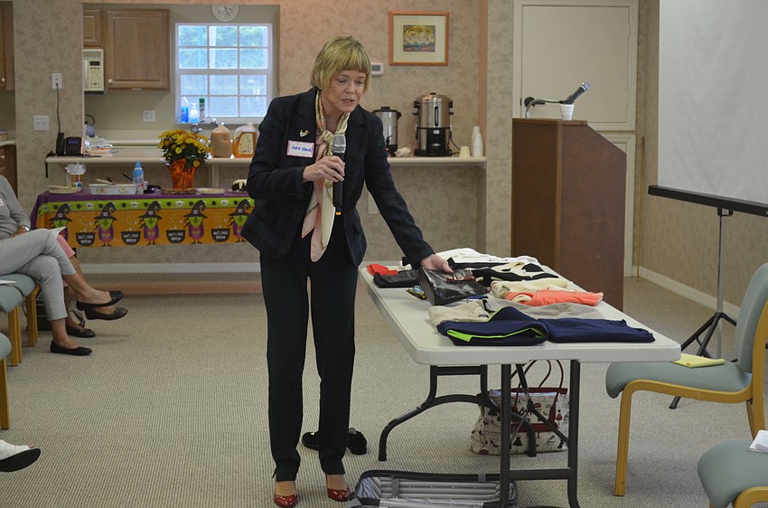 Janis Fawn shows the Garden Club what to bring on a two-week trip.