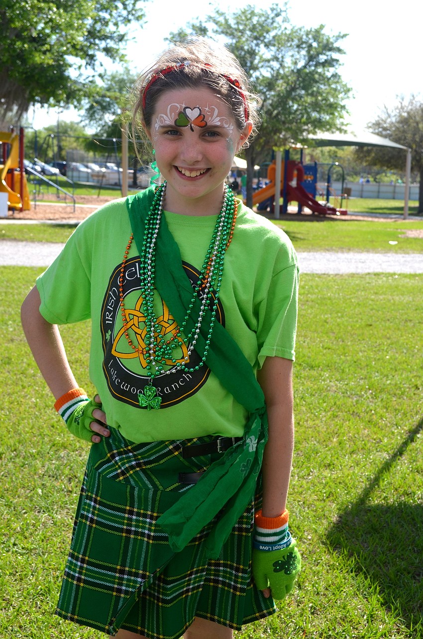 Emilee Gately shows off her face paint and costume.
