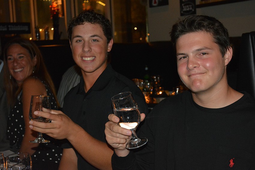 Cancer survivors Jake Taraska, a 17-year-old from Bradenton, and Kyle Peters, a 16-year-old from Sarasota, have helped Dick Vitale in his quest to raise funds for pediatric cancer research.